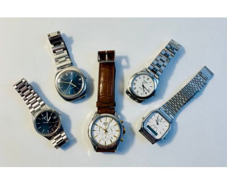 GIRARD PERREGAUX - A 1970s stainless steel wristwatch, rounded square brushed case, metallic blue dial, sweep second hand, da