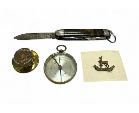 Militaria range with tench art brass cap box (3.8cm), Royal Warwickshire badge, compass and pocket knife.