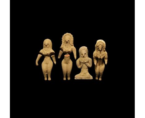 A mixed group of undated archaistic ceramic idol figures, each a recumbent nude female with headdress.  224 grams total, 8-12