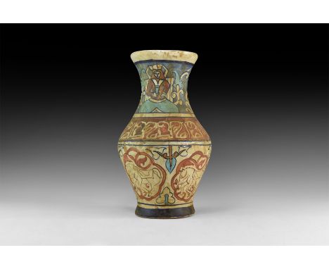 An undated archaistic glazed ceramic vase with bands of floral ornament and calligraphic text to the shoulder.  2.2 kg, 30cm 