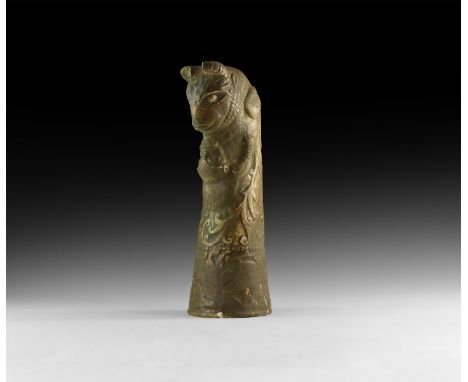 An undated archaistic tubular stone finial, slightly flared with returned beast-head terminal and monkey attacking.  3.4 kg, 