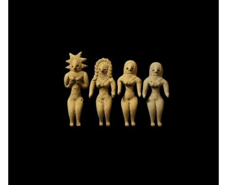 A mixed group of undatyed archaistic ceramic idol figurines, each a recumbent nude female with headdress.  234 grams total, 1