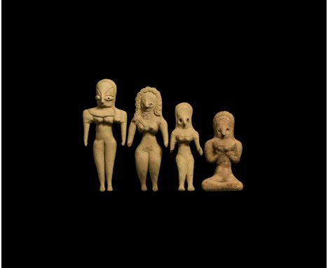 A mixed group of undated archaistic ceramic idol figures, each a recumbent nude female with headdress.  217 grams total, 9-13