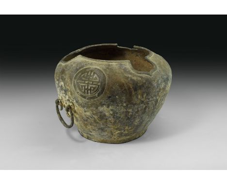 An undated archaistic bronze jar with basal ring, squat body, rim with three radiating heater-shaped slots, three decorative 