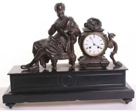 19th Century French, Mantle Clock with Spelter Figure of a Philosopher mounted to the slate base. Next to the figure is a sta