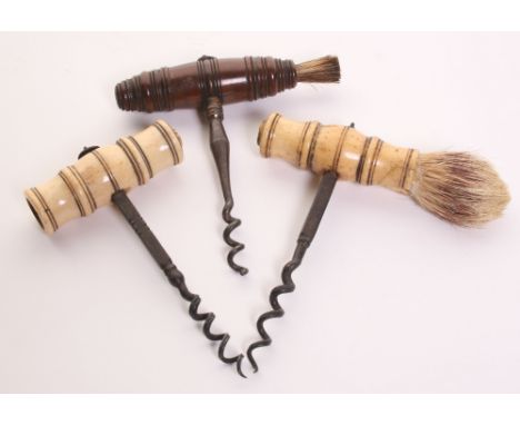 Three 19th Century Corkscrews, two with worked bone handles and one with a polished wooden handle. Two of the corkscrews are 