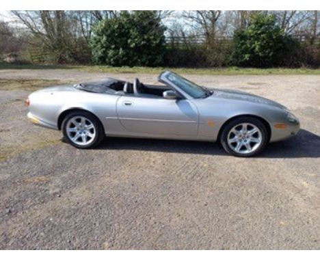 A classic Jaguar Car. A silver Jaguar XK8 4litre V8 convertible,T861CBD registered on 07-04-1999,chassis SAJJGAFD3AH038436eng
