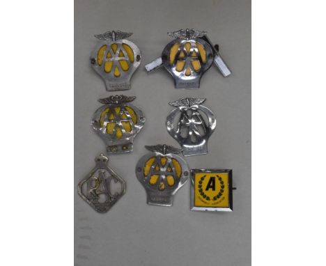 A selection of AA motor car hood or grill badges including 2B 5C and 02 also later Automobile Association badge and RAC