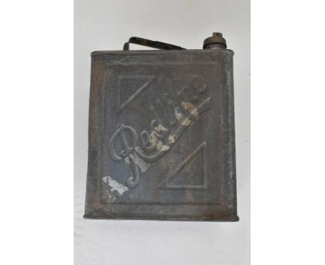 A vintage motor oil fuel can impressed for Redline with original brass cap