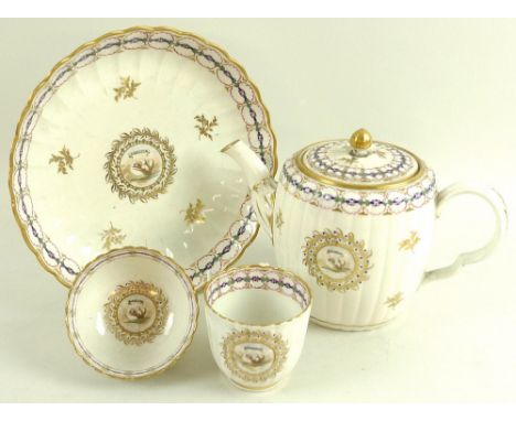 A Caughley part tea service, late 18th century, of fluted form, decorated in coloured enamels, with a continuous floral borde