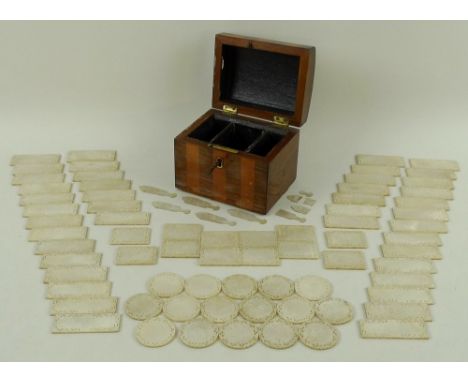 A good set of Chinese carved and pierced mother of pearl games counters, late 19th century, all engraved to both sides with v