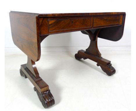 A William IV rosewood sofa table, drop leaf ends, beaded lower edge, two frieze drawers opposite two false drawer fronts, wit