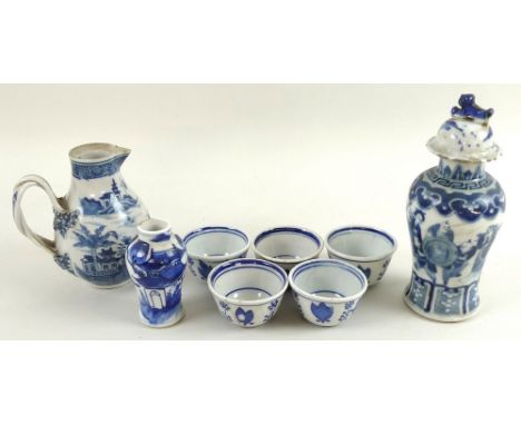 A collection of Chinese ceramics, including a 19th century jug, with twin strap handle terminating in floral bouquets, 12cm, 