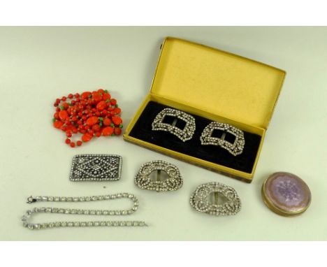 A group of vertu, comprising two pairs of 19th century paste buckles, a further Art Deco paste buckle, a paste necklace, an A