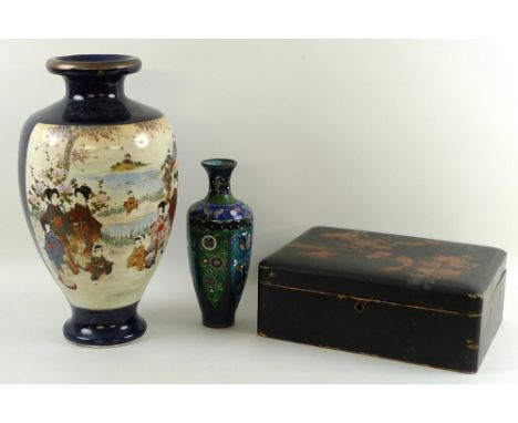 An early 20th century cloisonne enamel vase, of shouldered baluster form, decorated with flowers and butterflies, with panels