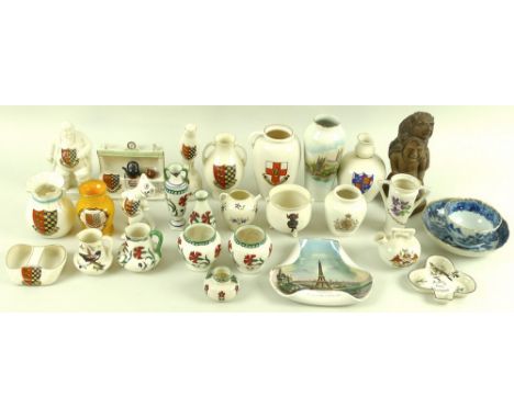 A group of collectable ceramics, including a Goss bisque figure 'The Devil Looking over Lincoln', in brown, various items of 