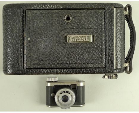 A Petie miniature camera, made in Western Germany, together with a Kodak No.1 Autographic Junior camera. (2)