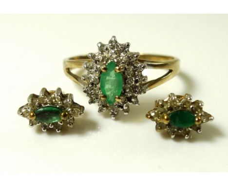 A gold, emerald and diamond ring, the marquis cut stone surrounded by diamond chips in a starburst setting, size N, together 