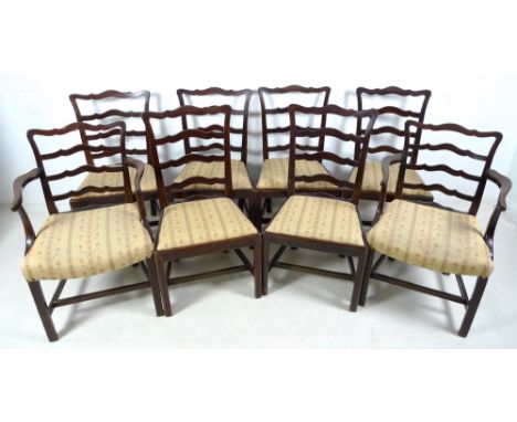 A set of eight mahogany 19th century Chippendale style dining chairs with waved ladderback slats and drop in seats, square le