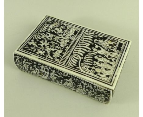 An unusual 19th century Indian double compartment intaglio carved ivory playing cards case, the intricately carved detail dep