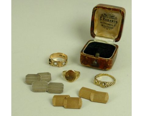 A group of gold rings and jewellery, comprising a 15ct gold ring, modelled as a belt and buckle, inset with two diamonds, eac