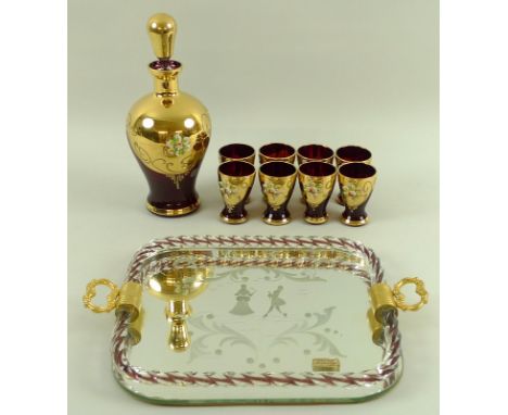 A collection of ruby and gold Murano glass ware, comprising a tray with an etching of two figures, 24 by 32.5cm, a glass deca