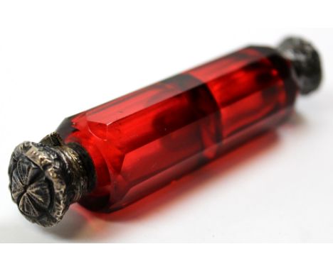 Victorian ruby glass double ended scent bottle with silver caps at each end