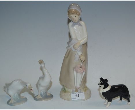 A Nao figure of a girl with a parasol; a Lladro figure of a goose; another; a Beswick Border Collie (4)