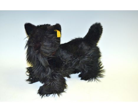 A Steiff Scottie Dog, red collar