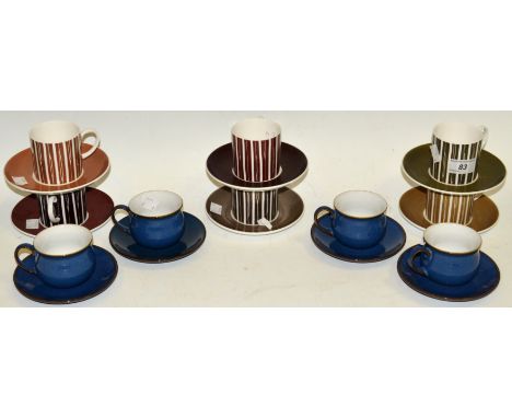 A Susie Cooper design part tea service; a set of four Denby electric blue coffee cups and saucers