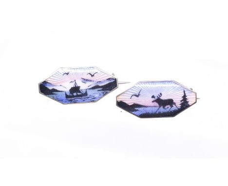 Two Norwegian enamel and silver brooches, Bull, Jansen & Prydz, one featuring a winter scene of a moose, the other with a Vik