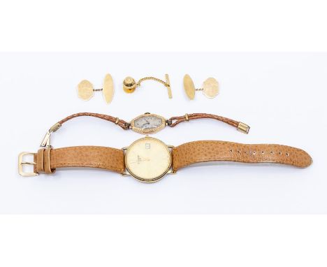 A gold plated gents Tissot watch, gold tone dial with gilt baton markers, date aperture at 3, dial approx 30mm, on a tan leat