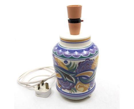 Poole Pottery: A Poole Pottery floral pattern lamp base on white ground. Height approx 19cm (minus fittings) approx 25cm (wit