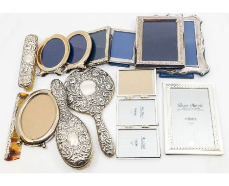 A George V silver four-piece dressing table set, Broadway &amp; Co, Birmingham 1919, comprising hairbrush, comb, mirror and c