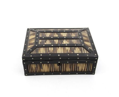 A mid 20th Century trinket box, ebonised wood and porcupine needles with ivory detailing&nbsp;