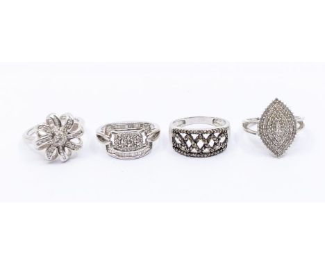 A collection of four diamond and silver Gems TV gem set rings to include three white diamond cluster rings and one set with c