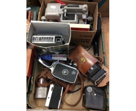 Collection of vintage cameras including Bolex cini camera, polaroid cinema camera / projector, slide projector, Zeiss camera 