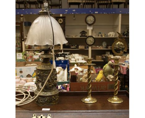Brass table lamp with smoked glass shade with 17th Century detail, along with two barley twist candle sticks