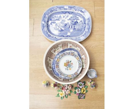 A collection of 19th Century and 20th Century ceramics including meat plates, plates in Spode and wash bowl with ceramic flow