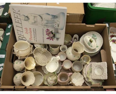 A collection of Belleek china, early 20th Century second mark items, including tea wares, cups, saucers, jugs and with sixth 