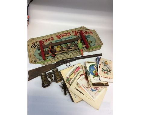 Collection of vintage Christmas cards, theatre glasses and 1930s/40s wooden shooting game