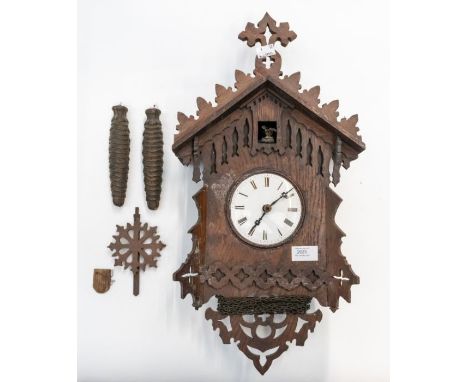 Late Victorian Black Forest cuckoo clock. Two-train movement with wooden pillars, two bellows, two weights and pendulum. Cond
