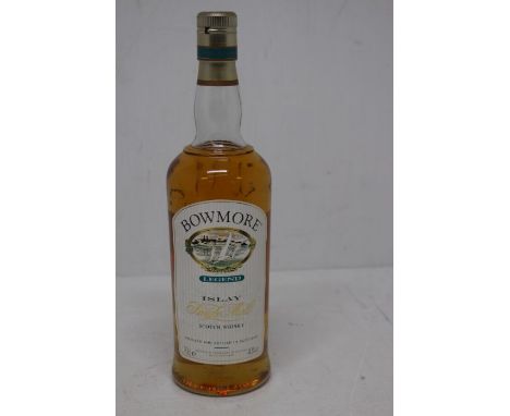 A Bottle Of Bowmore Legend Single Malt Scotch Whisky Bottle Is Still Sealed And Measures Into Neck, Label Has Slight Tears An