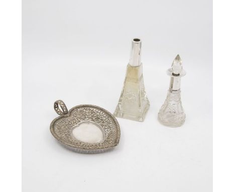 A group of silver to include:&nbsp; George V cut glass and silver mounted elongated scent bottle, facet cut stopper, the silv