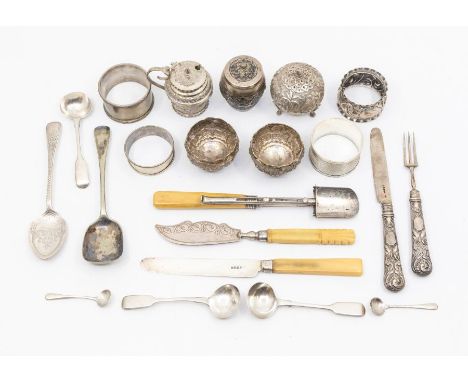 A collection of silver, including four napkin rings, two salt spoons, three mustard spoons, silver knife and fork, silver spo