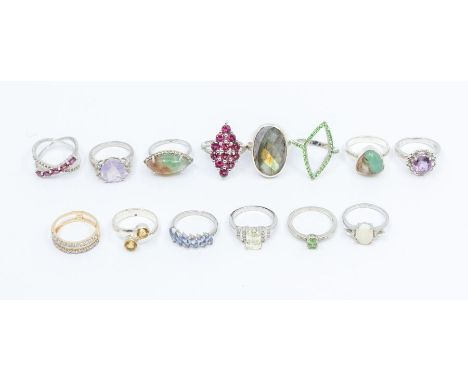 A collection of fifteen Gems TV silver and gemstone rings to include a lavender moon quartz and white topaz ring, size L1/2, 