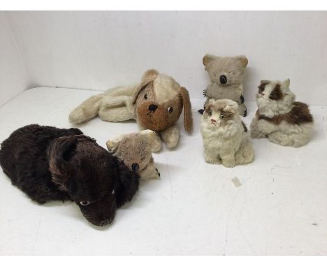 A collection of vintage pj cases in the style of dogs, mid 20th Century, along with Karola bears and cats