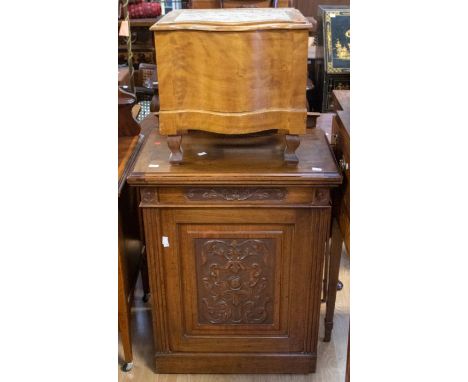 A late 19th Century oak carved floor cupboard with single carved cupboard door ,&nbsp; along with a 19th Century commode