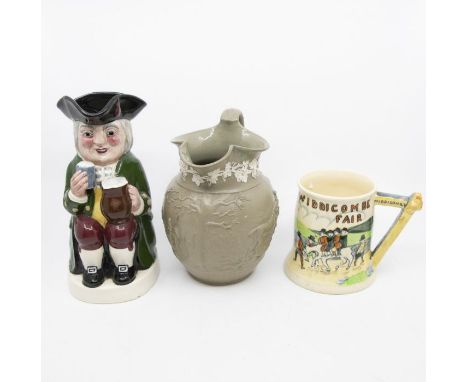 A 1930's musical Widdicombe Fair tankard, along with a musical Toby jug and a Wedgwood hunting water jug