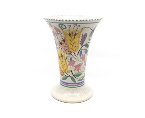 Poole Pottery: A Poole Pottery trumpet shape vase with floral decoration. Height approx 23.5cm. Marks to the base.Condition: 